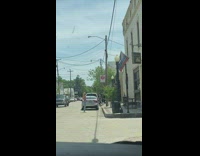 Woman in tube top tiktok dance on the sidewalk Part 2