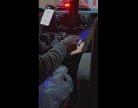 Uber driver zooms in on photos of women