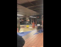 Grand Central station leaks from roof and floods subway, yellow mop bucket