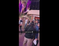 Girl wearing lingerie holds guys hand