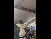 Man plays with toy car rides subway