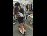 Couple balancing on a board fail 