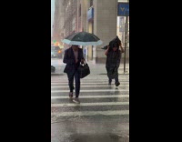 Man use garbage bag as a raincoat