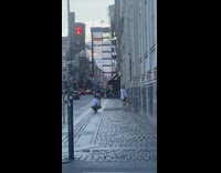 Girl white blouse hand bag traffic lights