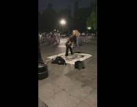 woman long black hair dances on dirty blanket