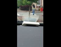 Woman walk back and forth crosswalk video