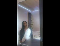 Girl watches news recap of year 2020