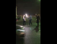 Woman middle of road LED Eiffel tower night