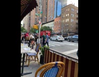 Guy and lady transport payphone 