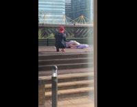 Purple sports bra leggings girl leans back 