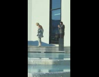 Short hair girl grey clothes white boots