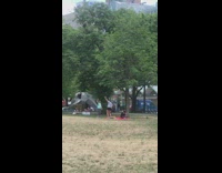Two women practices tiktok dance at the park