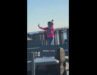 Woman in Pink Poses for Selfie with Mannequin Part 