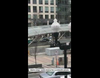 Girl white blazer stand metro stop LinkedIn