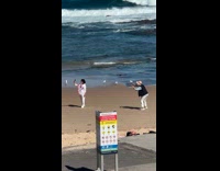 Woman beach selfie pictured by another woman