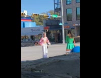Lady Take Picture on Middle of Street