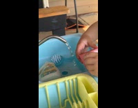 Woman confused with laminar flow on play sink