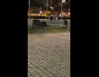 Two women tiktok dance at the park near the river