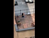 Collab IITW - Woman is doing a yoga exercise at the rooftop building