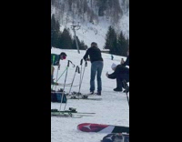 Man on Ski Poses with its Pants Down