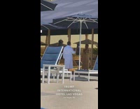 Guy white robe take selfie window glass