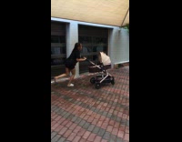 Girl run in circles baby on stroller