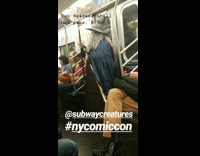 man in wizard old man costume on train