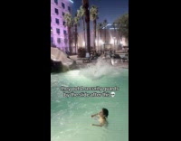 Man slides and does backflip to pool