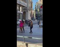 Man and woman sexy dance near the streets