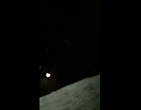 girl in white jumping off second story 