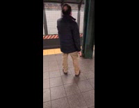 Man on subway platform sings burger king song 