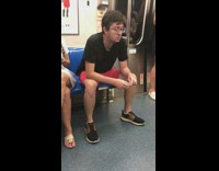 Collab Subway Creatures - Guy red shorts glasses talks to himself o subway fiddles with earphones
