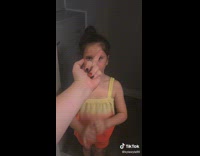 Daughter copy middle finger that her mom did. 