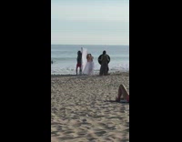Two girl hug white dress cloth  beach