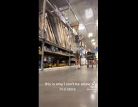 Girl holds long wooden stick home depot