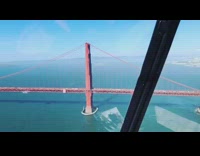 Aerial view of Golden Gate Bridge, Alcatraz, and the Bay Area skyline from helicopter