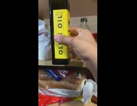 Olive Oil Bottle fits perfectly on the kitchen cabinet