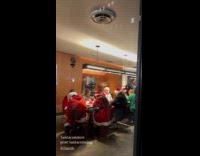 Bunch of Santa eats together at Chipotle