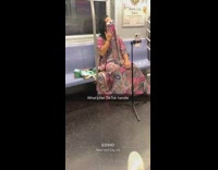 Pink face mask matches dress lady subway 