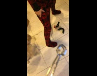 Dropping elf on shelf inside of fridge little boy 