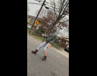 Girl and mom dance in neighborhood street