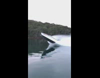 Speedboat with front above water 