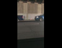 Guy rides onewheel with stick 