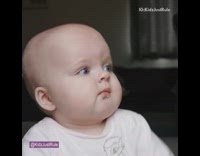 White bambi shirt baby girl eats food 