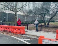 Man gray jacket sir railings throw leaves photo shoot