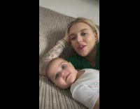 Baby smiles because daddy enters the room