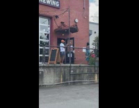 Blue dress girl brewery orange hat guy 