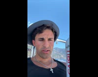 Man uses facial spray close to face