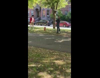 Man red British uniform photo shoot park