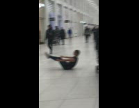 Girls block shopping mall yoga pose